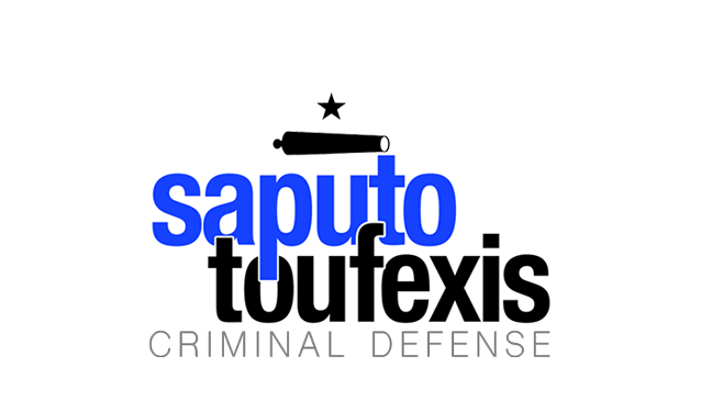 Saputo Toufexis Logo featuring the Texas star above a canon and interlocking Saputo Toufexis text in blue and black